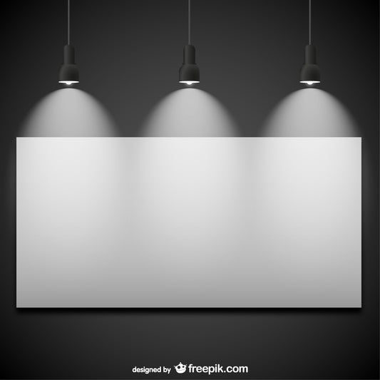 Three hanging lights illuminating a white rectangular panel on a dark background